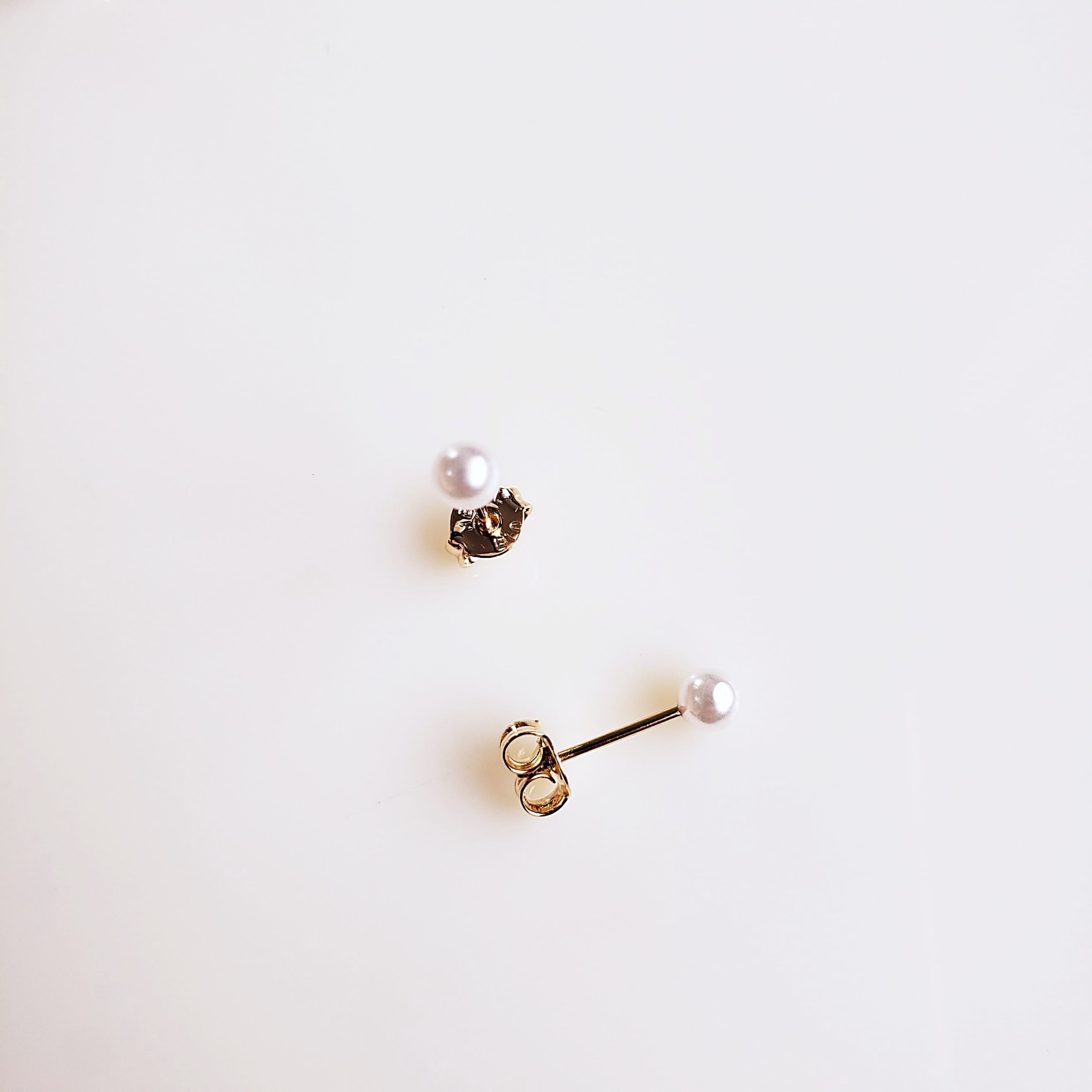 #Brinco pérola botão - shell  2mm  - 