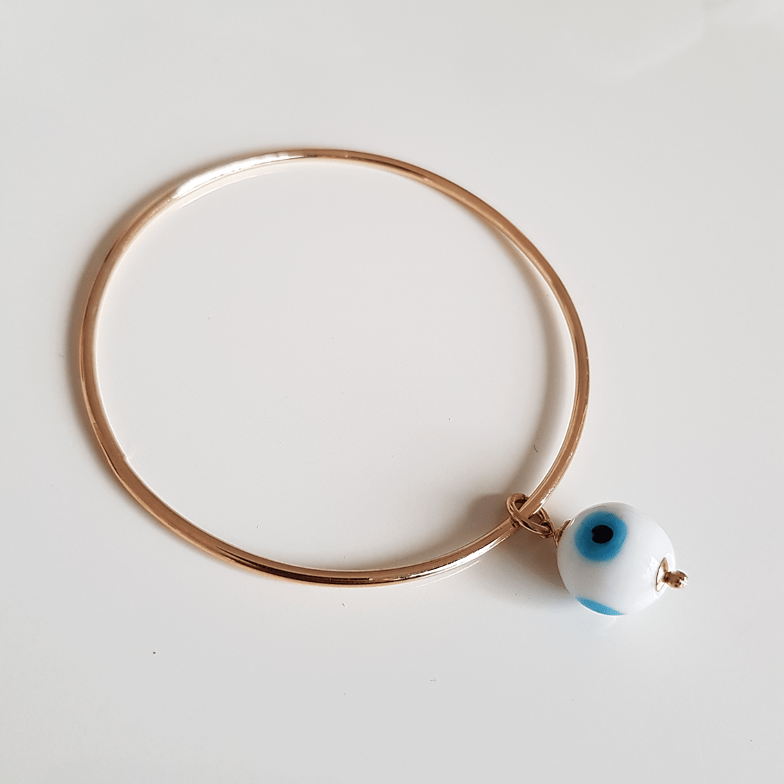 Pulseira de elo e pingente  de olho grego