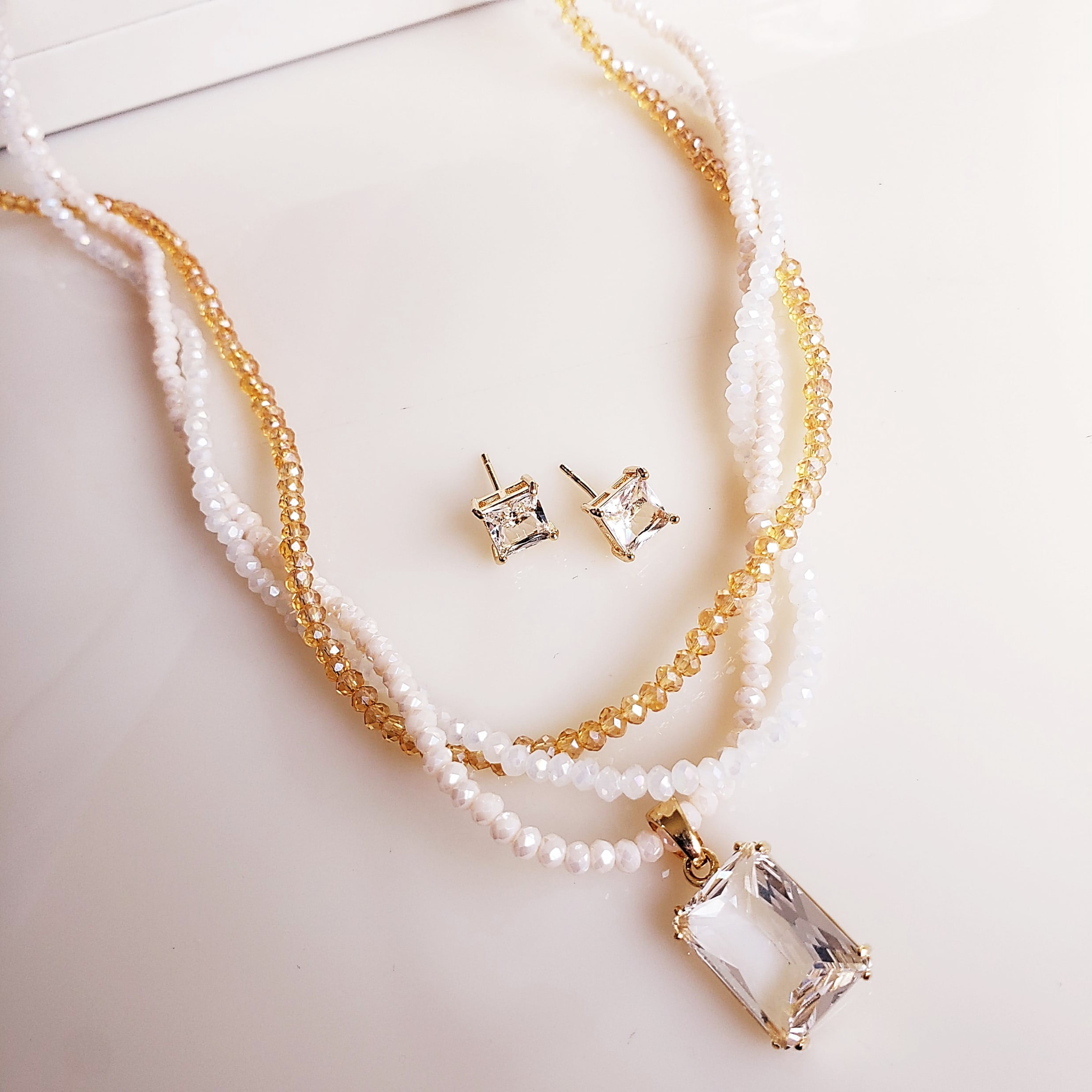 #Conjunto brinco + colar torside critais nude - banhado  ouro   