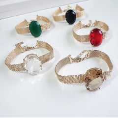 Pulseira corrente malha fita dourada com cristal oval champanhe