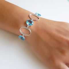 1-Pulseira de elos ovais  e cristais azul aquamarine - banhada a prata