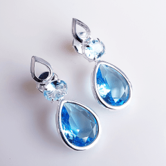 1-Brinco com cristal azul mar - banhado a prata  
